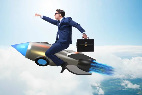 Businessman flying on rocket in business concept