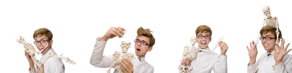 Funny doctor with skeleton isolated on white — Stock Photo, Image