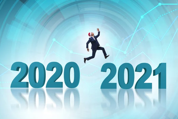 Forretningsmand hoppe fra år 2020 til 2021 - Stock-foto