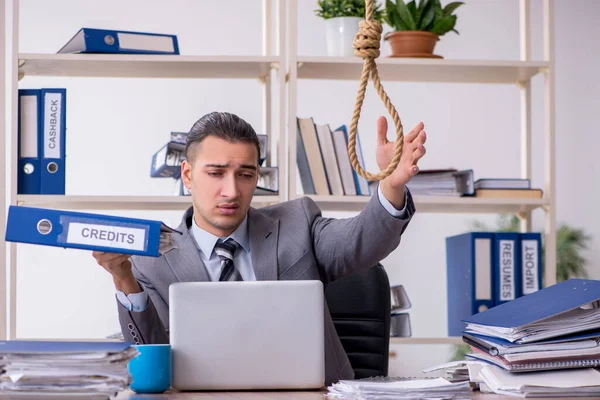 Young male employee committing suicide at workplace — Stock Photo, Image