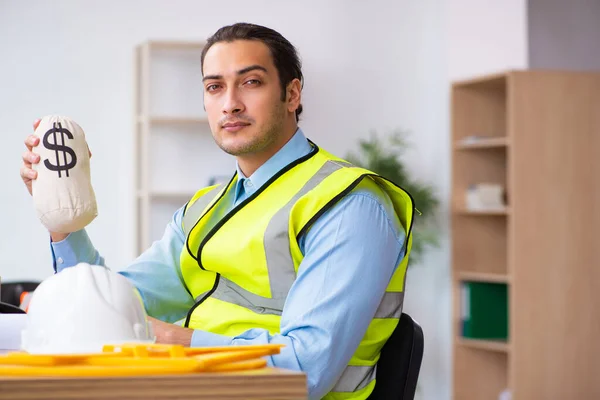 Young male architect working in the office — Stock Photo, Image