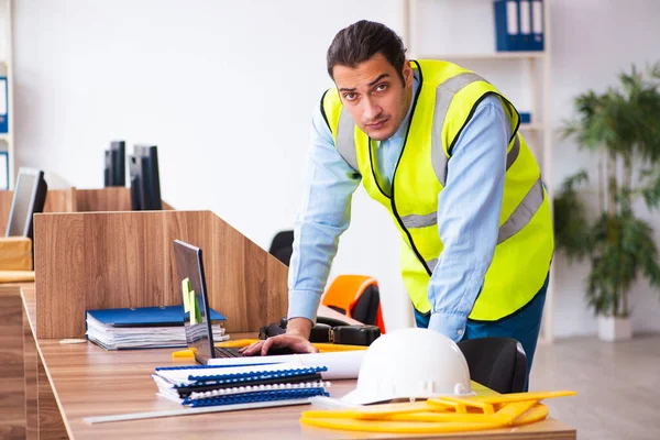 Young male architect working in the office — Stock Photo, Image