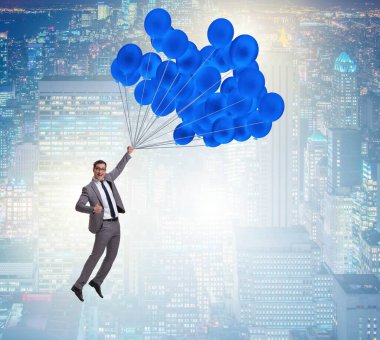Balonla uçan iş adamı meydan okuma konseptinde