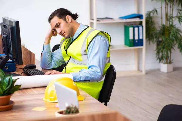 Young male architect working in the office — Stock Photo, Image