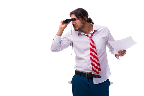 Young male employee holding binoculars and paper — Stock Photo, Image