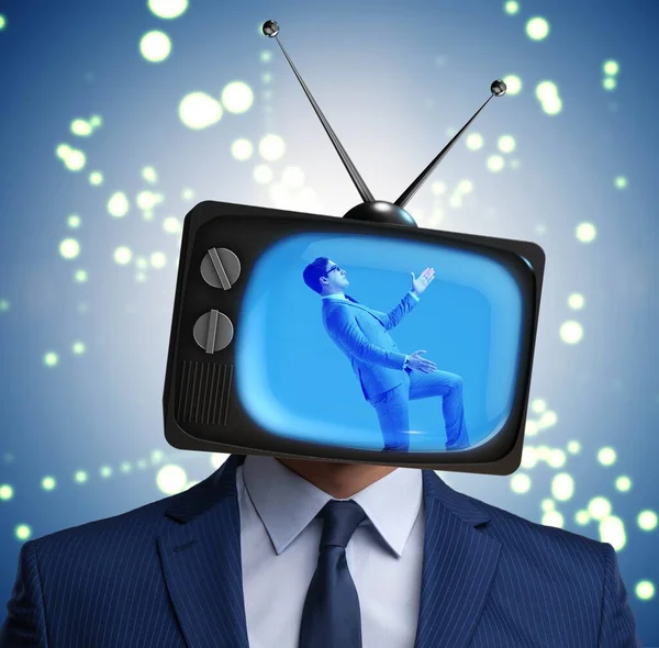 Man with television head in tv addiction concept — Stock Photo, Image