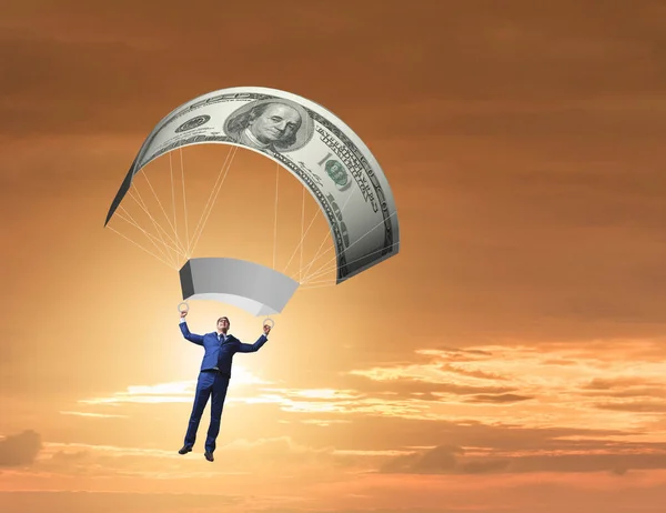 Zakenman in gouden parachute concept — Stockfoto