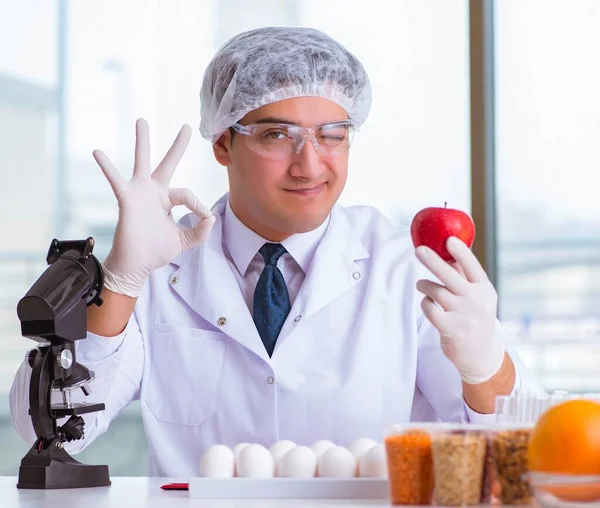 Nutrition expert testing food products in lab