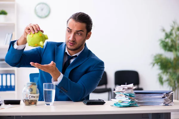 stock image Young male accountant in budget planning concept