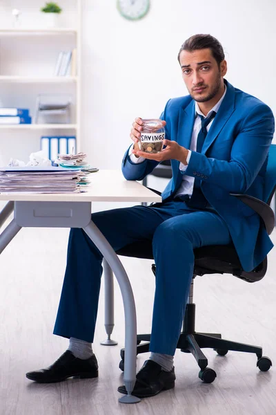 Young male accountant in budget planning concept — Stock Photo, Image