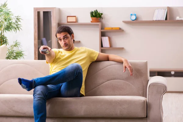Young man student boring at home during pandemic — Stock Photo, Image