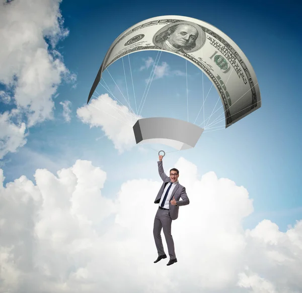 Zakenman in gouden parachute concept — Stockfoto