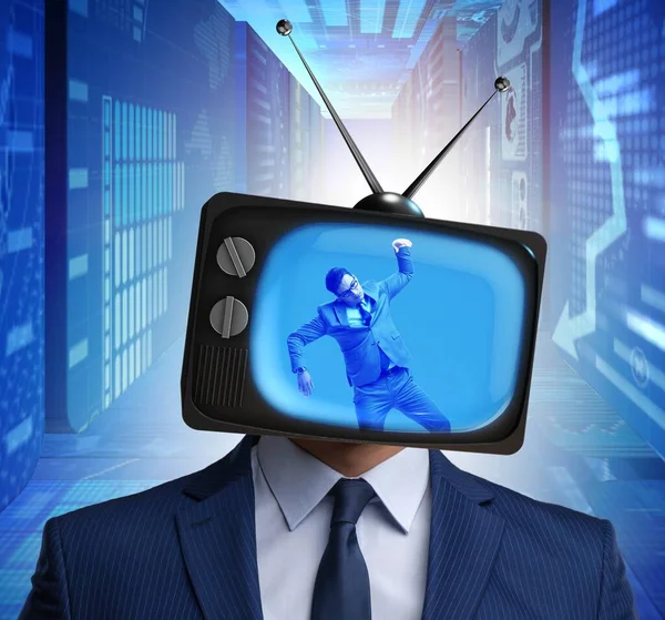 Man with television head in tv addiction concept — Stock Photo, Image