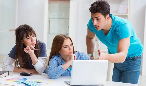 Team of designers discussing new interior project — Stock Photo, Image