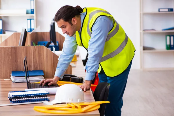 Young male architect working in the office — Stock Photo, Image