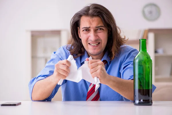 Young male employee being fired from his work at home — Stock Photo, Image