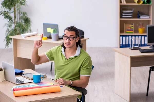 Young male designer working in the office — Stock Photo, Image