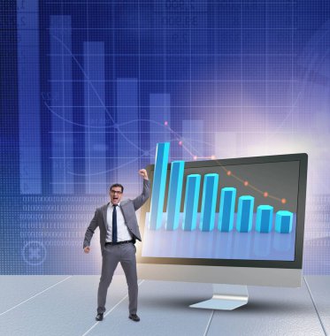 Grafiklerle ekonomi tahmini konseptinde iş adamı