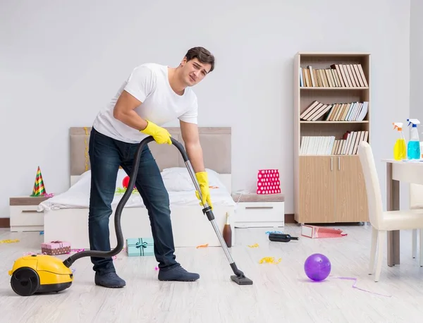 Young man after the wild Christmas party — Stock Photo, Image