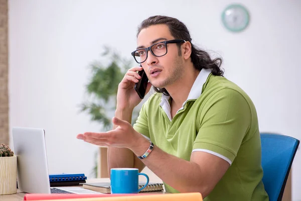 Young male designer working in the office — Stock Photo, Image