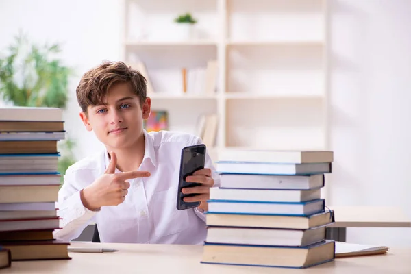 Schoolboy preparing for exams in the classroom — Stock Photo, Image