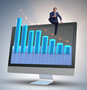 Grafiklerle ekonomi tahmini konseptinde iş adamı