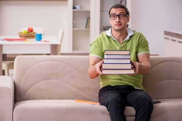 Young male student preparing for exams at home — Stock Photo, Image
