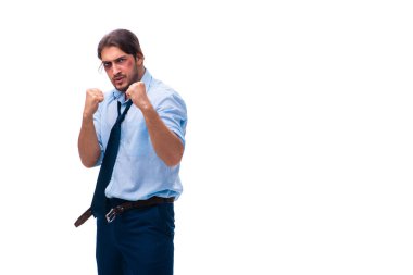 Genç mutsuz erkek işçi beyazda izole edilmiş.