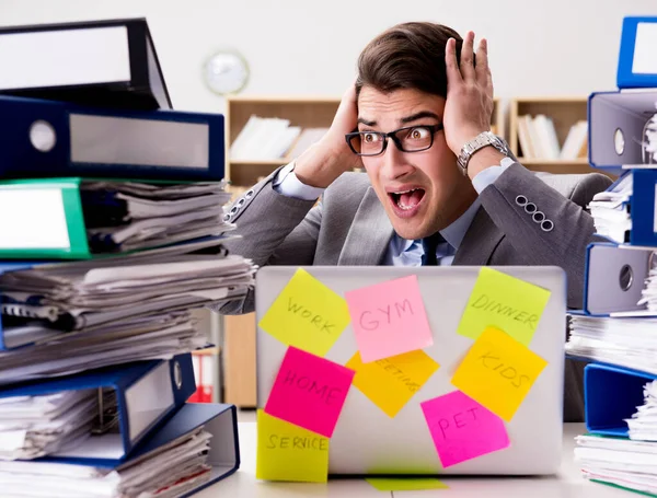 Businessman struggling with multiple priorities — Stock Photo, Image