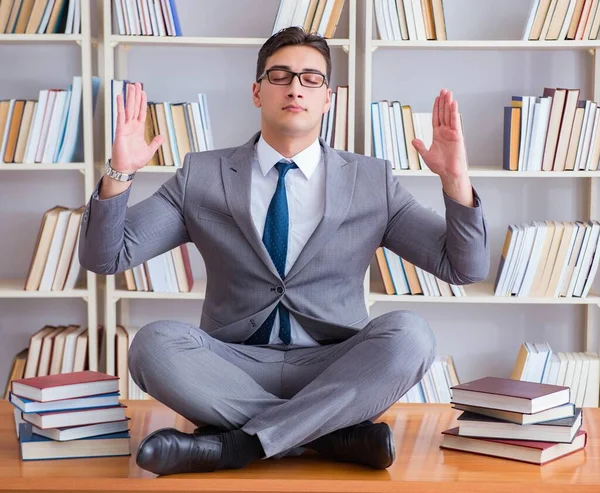 Businessman student in lotus position concentrating meditating — Stock Photo, Image