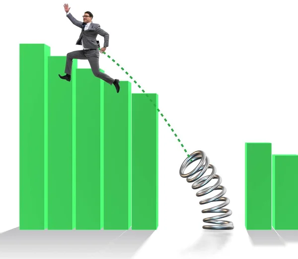 Business people jumping over bar charts — Stock Photo, Image