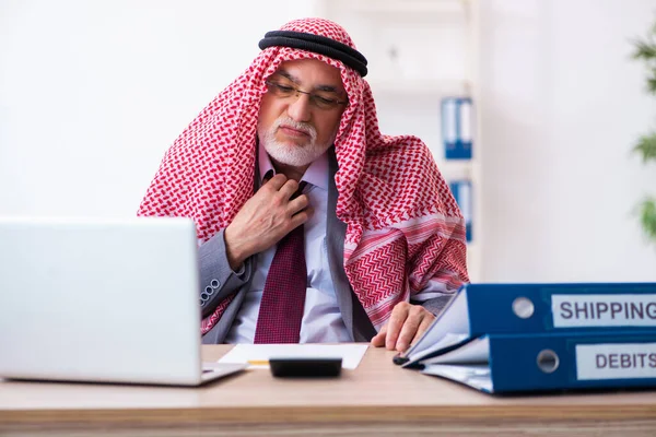 Male arab bookkeeper extremely tired with an excessive work — Stock Photo, Image