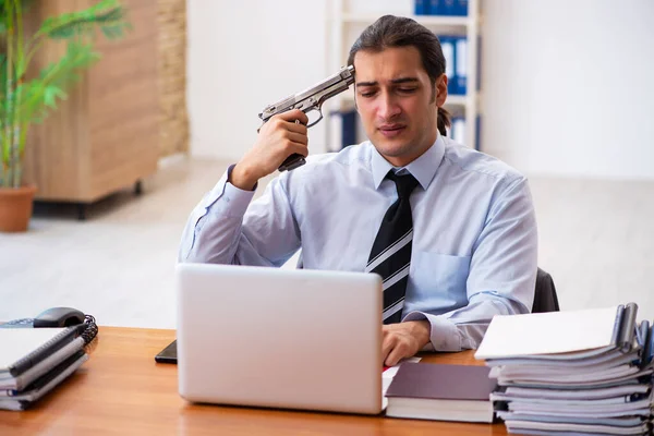 Depressed male employee committing suicide at workplace — Stock Photo, Image