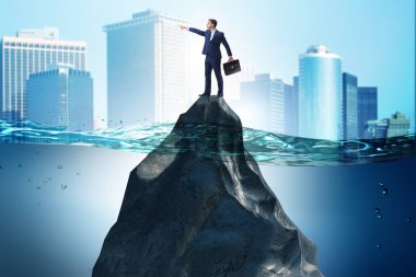 Issız adada iş kavramında çaresiz iş adamı.