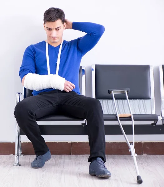 Desperate man waiting for his appointment in hospital with broke