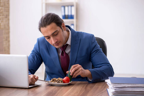 Young businessman working in the office