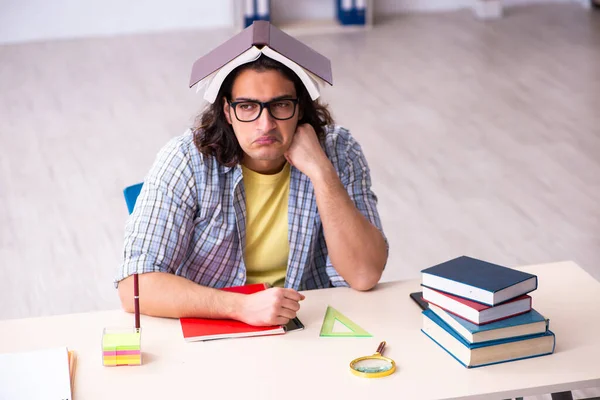 Young male student preparing for exams — Stock Photo, Image