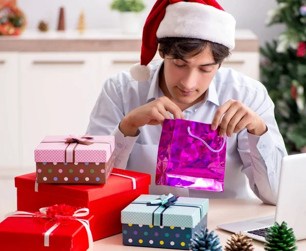 Young employee businessman in office christmas concept — Stock Photo, Image