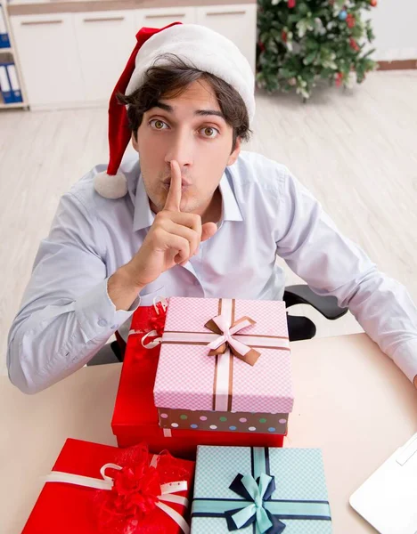 Young employee businessman in office christmas concept — Stock Photo, Image