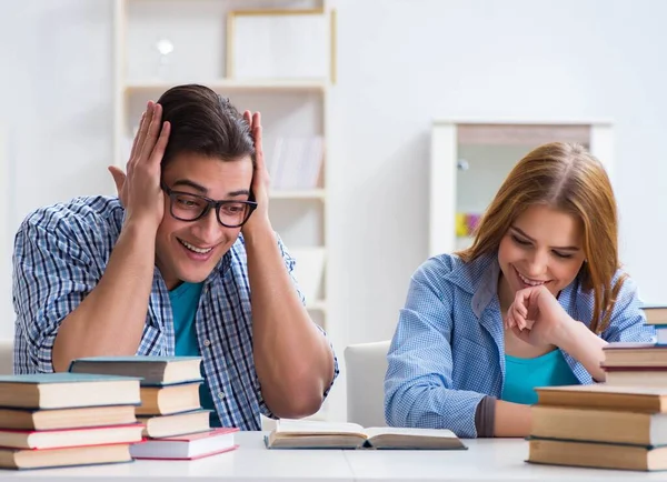 Pair of students studying for university exams — Stock Photo, Image