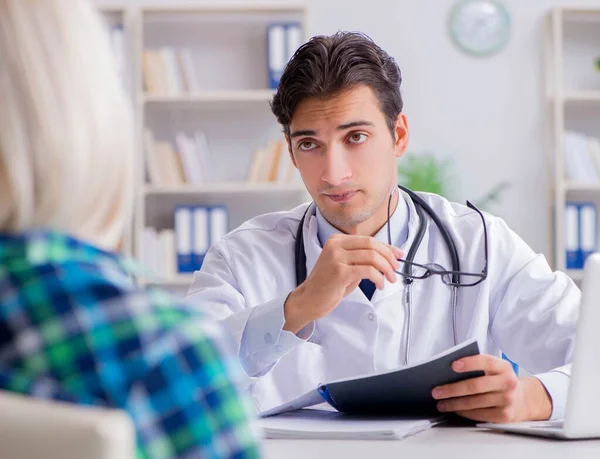 Patient visiting doctor for medical check-up in hospital Royalty Free Stock Images