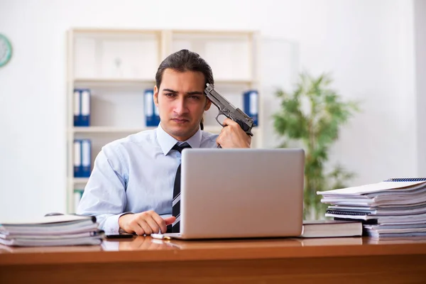 Depressed male employee committing suicide at workplace — Stock Photo, Image