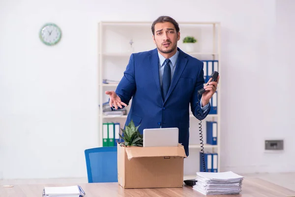 Young man being fired from his work — Stock Photo, Image