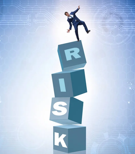 Businessman in risk and reward business concept — Stock Photo, Image