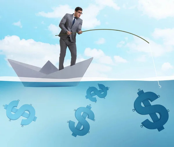 Businessman fishing dollars money from paper boat ship — Stock Photo, Image