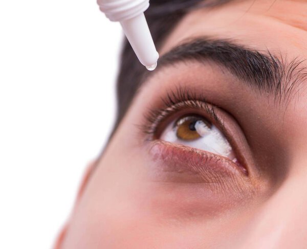 Young man in eye care medical concept