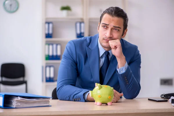 Young male employee in budget planning concept — Stock Photo, Image