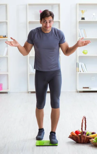 Der Mensch fördert die Vorteile gesunder Ernährung und Sport — Stockfoto