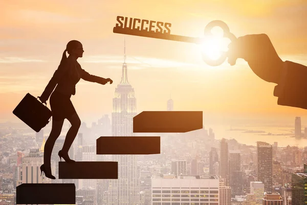 Businesswoman climbing the career ladder of success — Stock Photo, Image