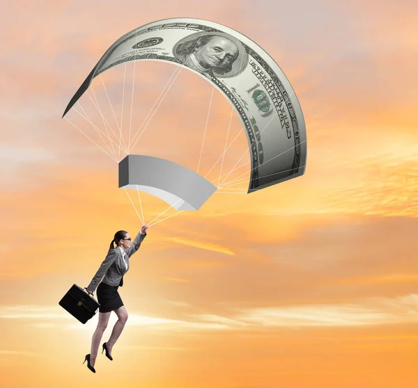 Бізнес-леді в концепції золотого парашута — стокове фото